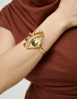 Bangle bracelet with a striking central eye