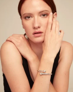 Bangle bracelet with inner spring