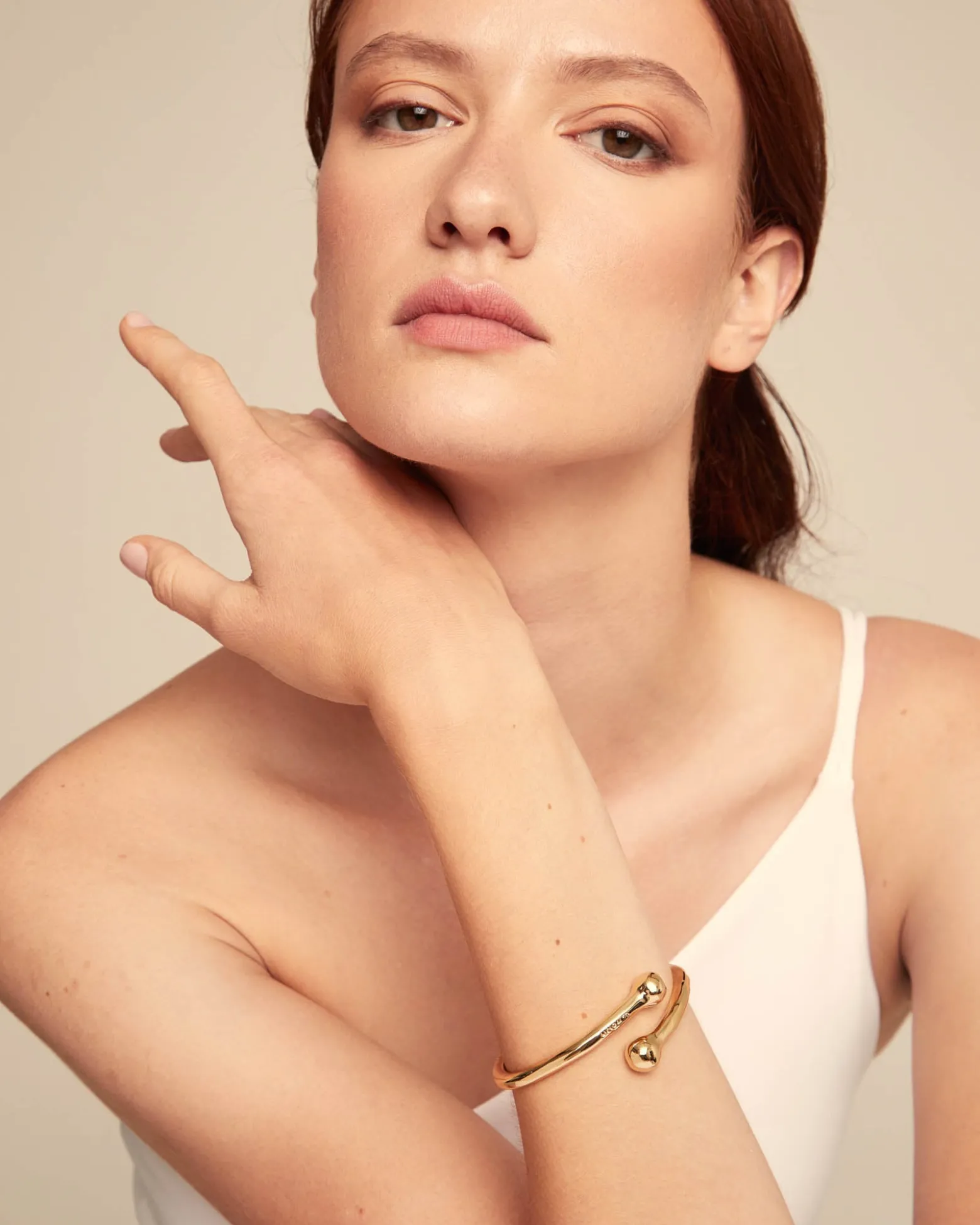 Bangle bracelet with inner spring