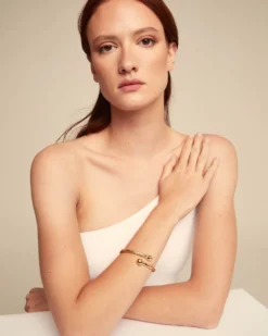 Bangle bracelet with inner spring