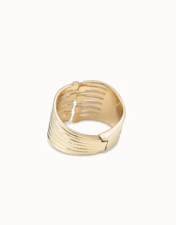 Bangle bracelet with multiple nail heads