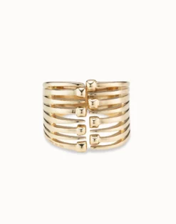 Bangle bracelet with multiple nail heads