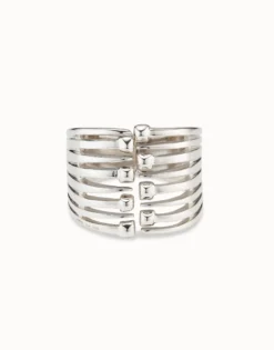 Bangle bracelet with multiple nail heads