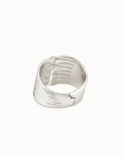 Bangle bracelet with multiple nail heads