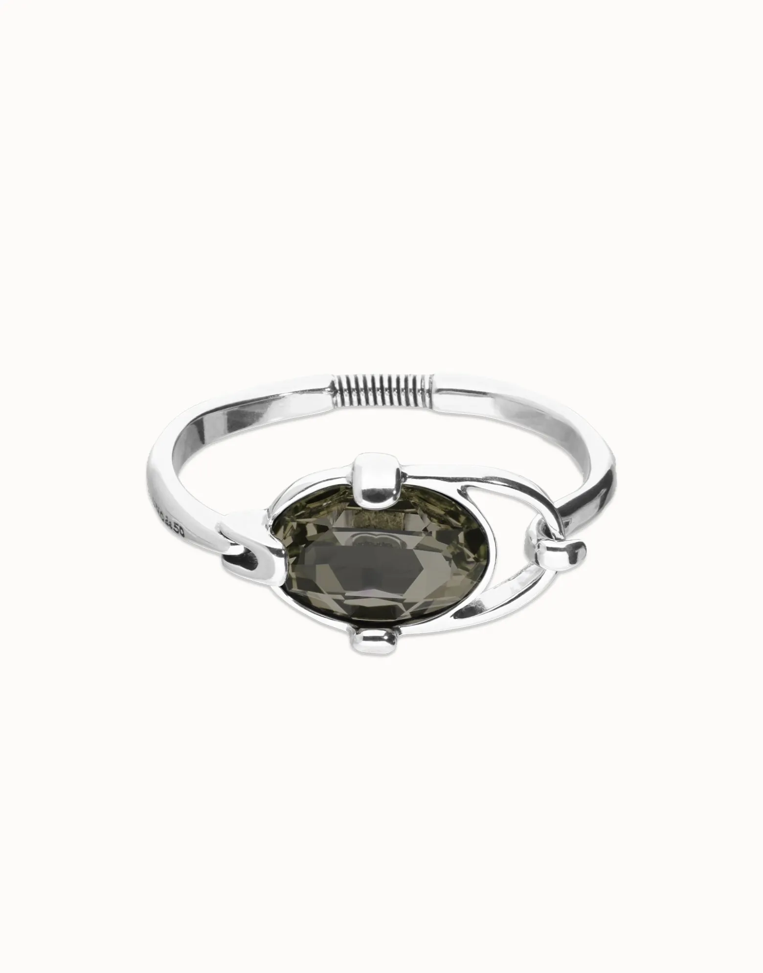 Bangle bracelet with oval faceted gray crystal