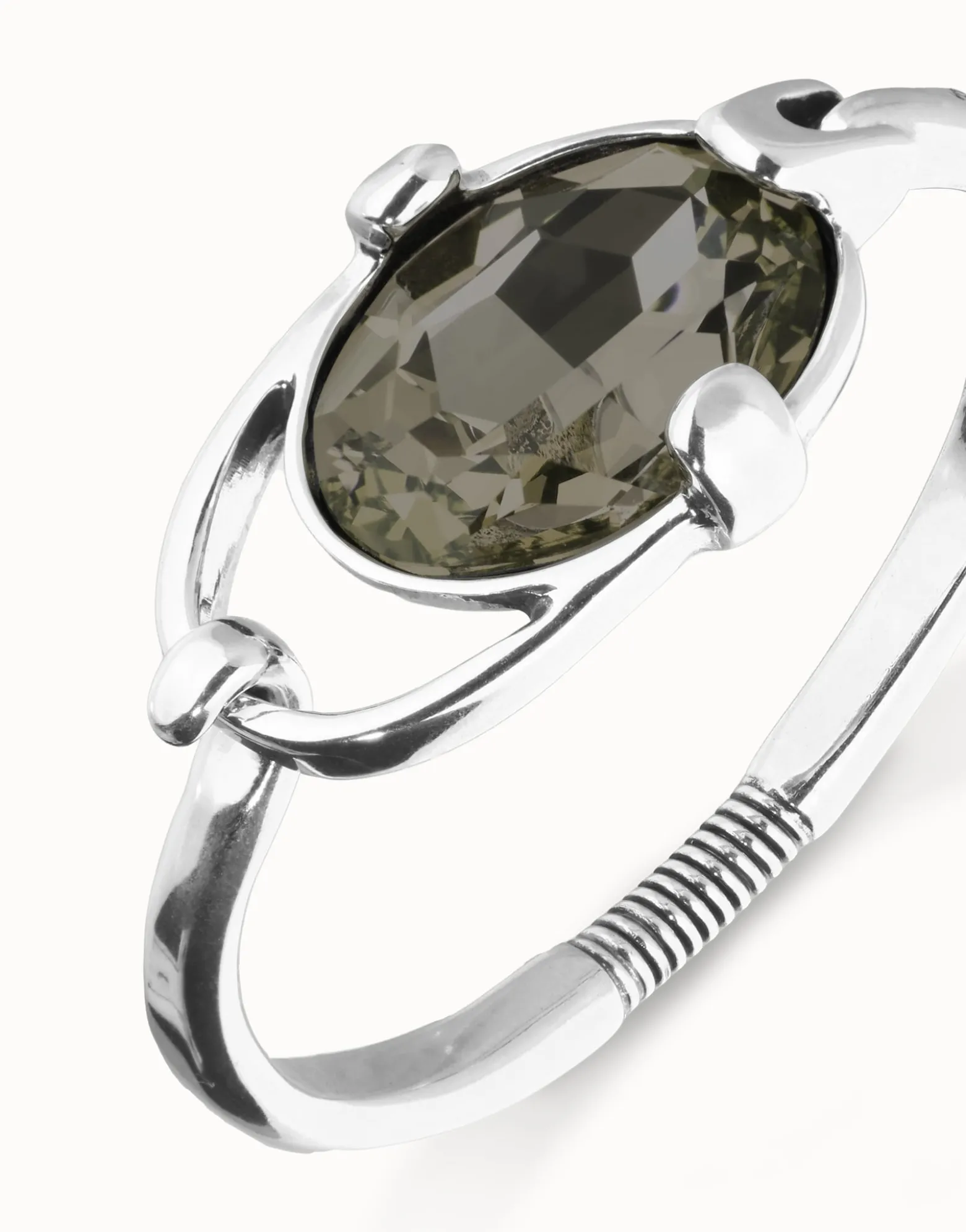 Bangle bracelet with oval faceted gray crystal