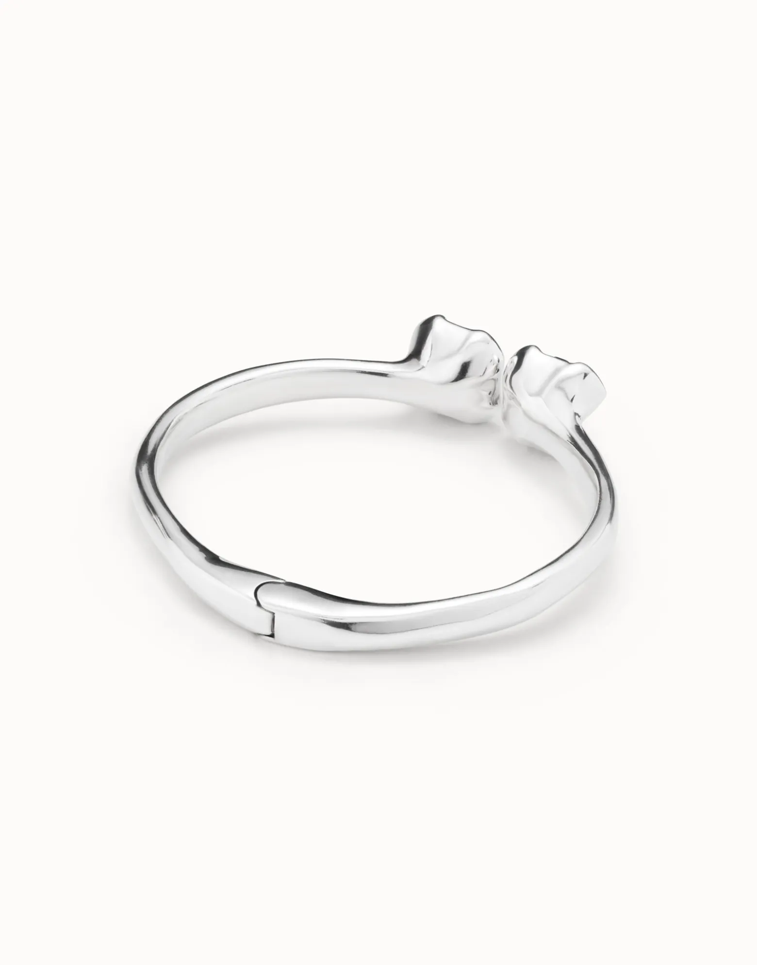 Bangle bracelet with two blue crystals