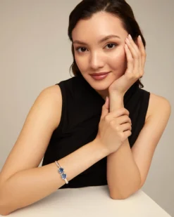 Bangle bracelet with two blue crystals