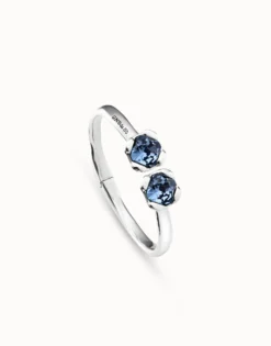 Bangle bracelet with two blue crystals