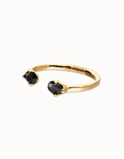 Bangle bracelet with two faceted black oval crystals