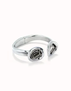 Bangle bracelet with two grey crystals
