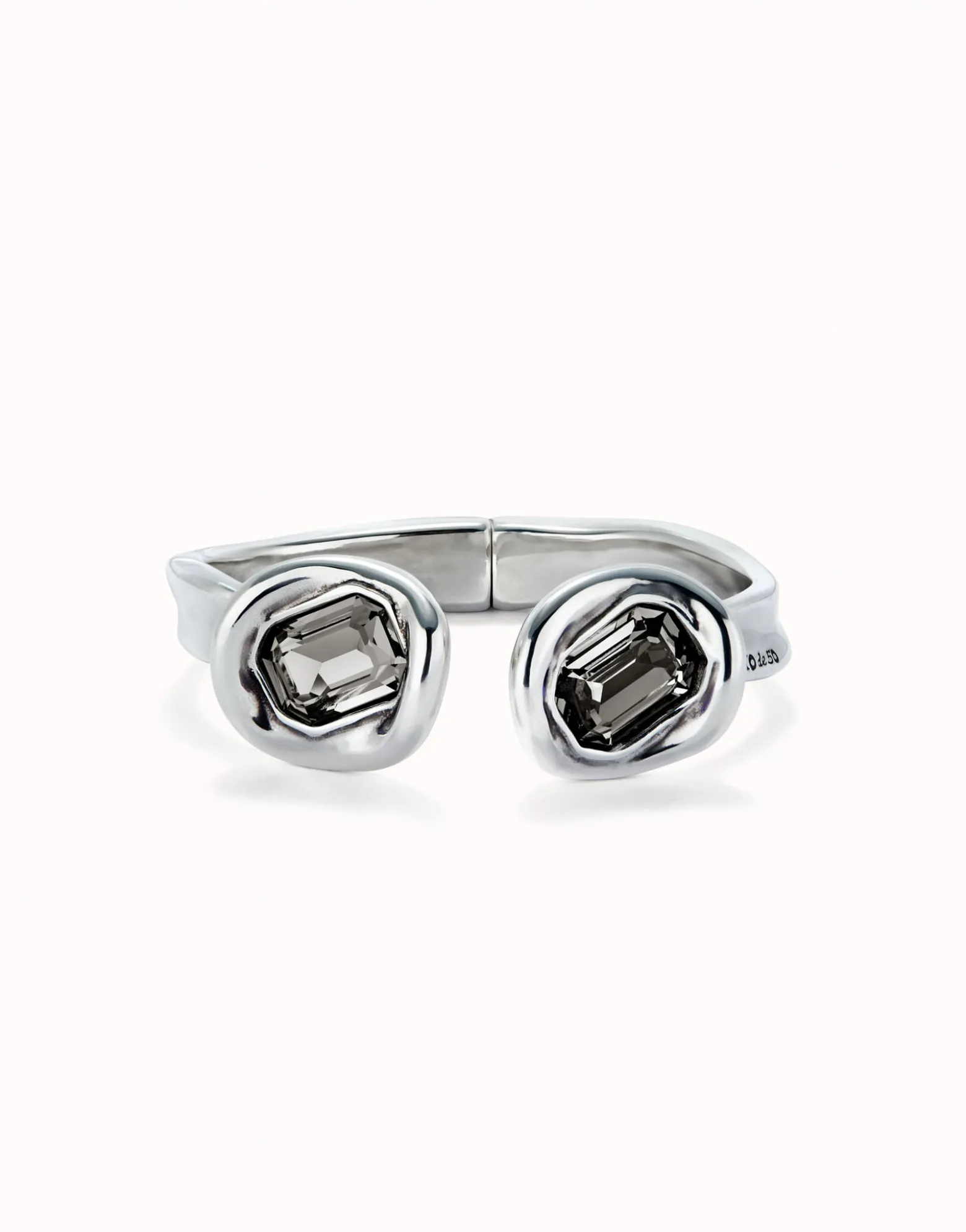 Bangle bracelet with two grey crystals