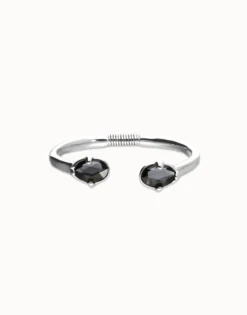 Bangle bracelet with two oval faceted black crystals