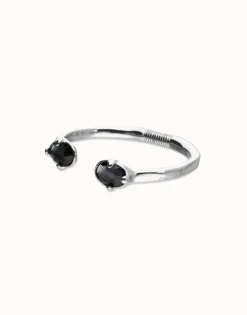 Bangle bracelet with two oval faceted black crystals
