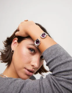 Bangle bracelet with two pink crystals