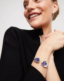 Bangle bracelet with two purple crystals