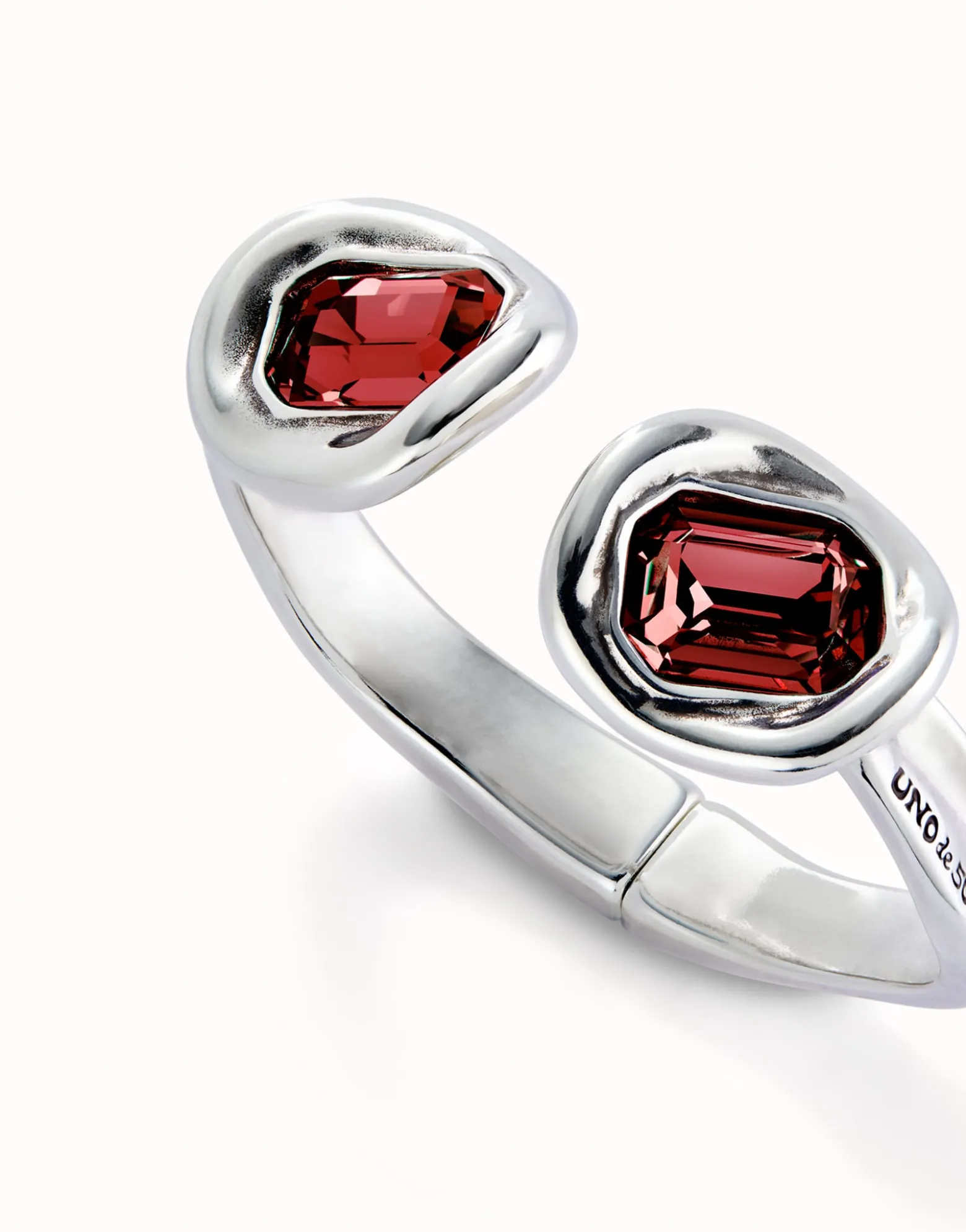 Bangle bracelet with two red crystals