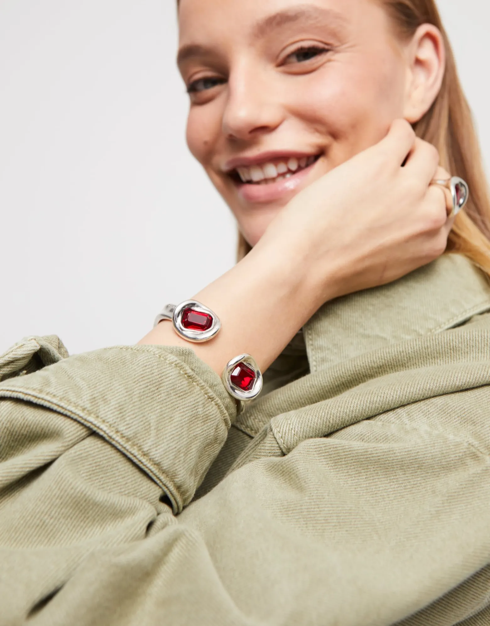 Bangle bracelet with two red crystals
