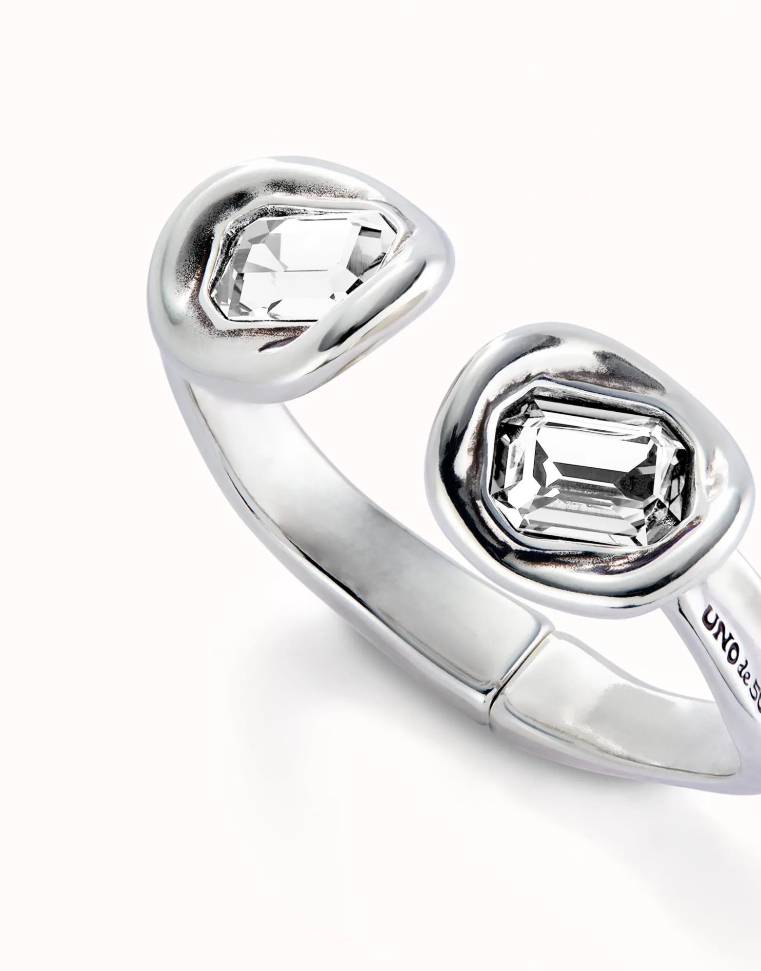 Bangle bracelet with two white crystals