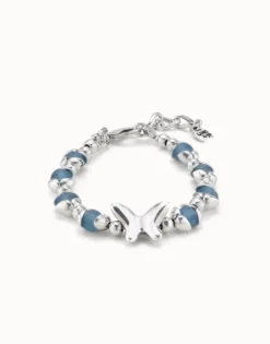 Beaded bracelet with blue crystals and a central butterfly