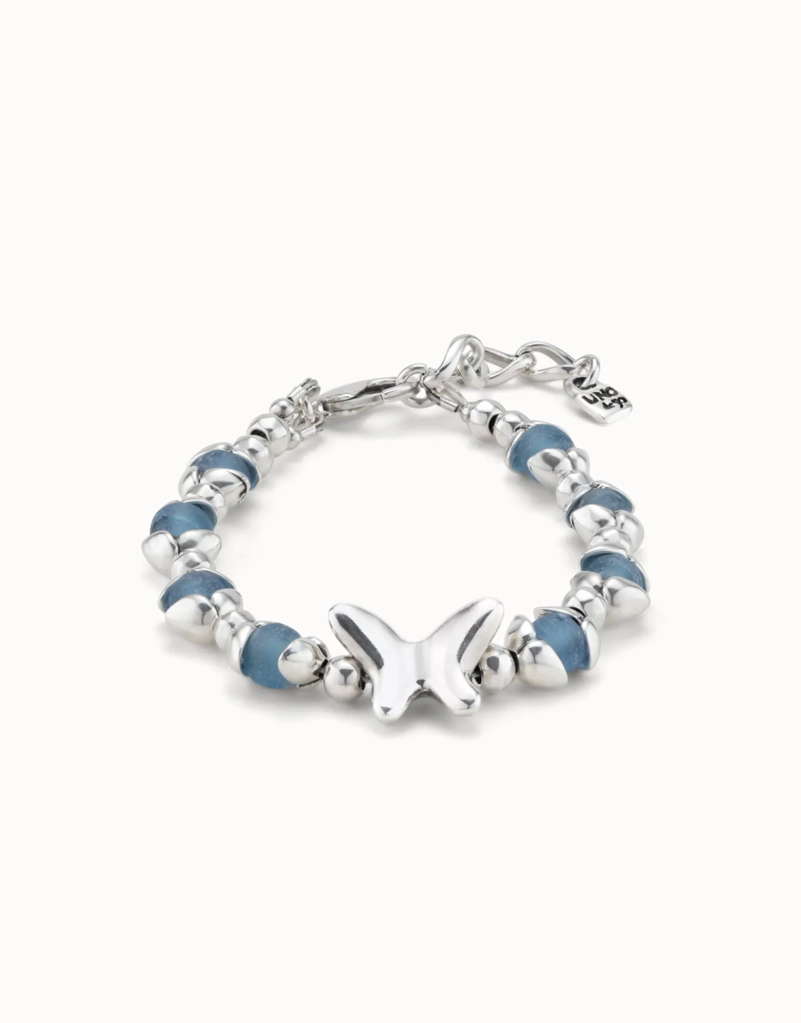 Beaded bracelet with blue crystals and a central butterfly