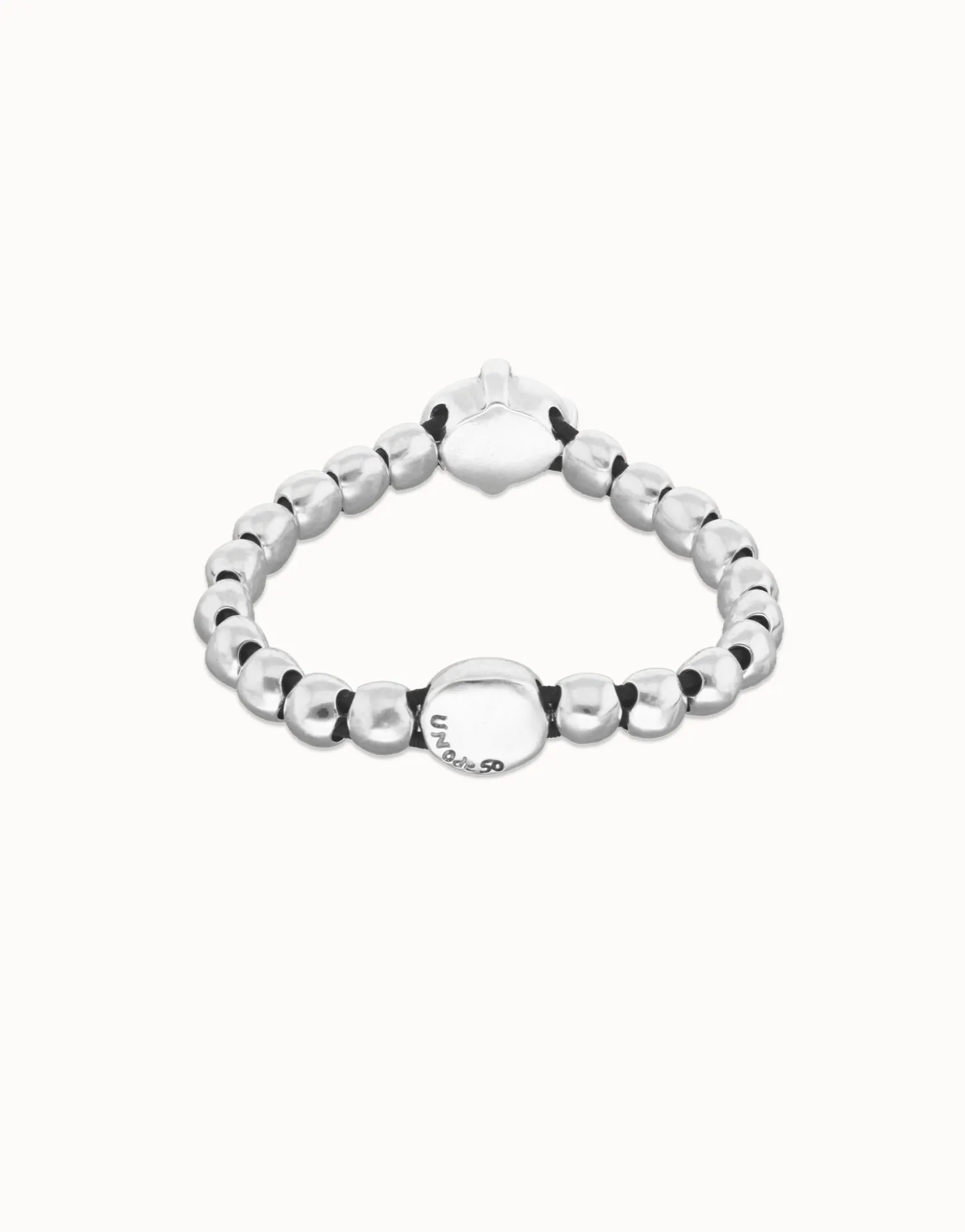 Beaded bracelet with blue oval faceted crystal