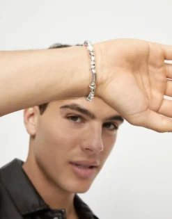 Beaded bracelet with silver and ivory beads