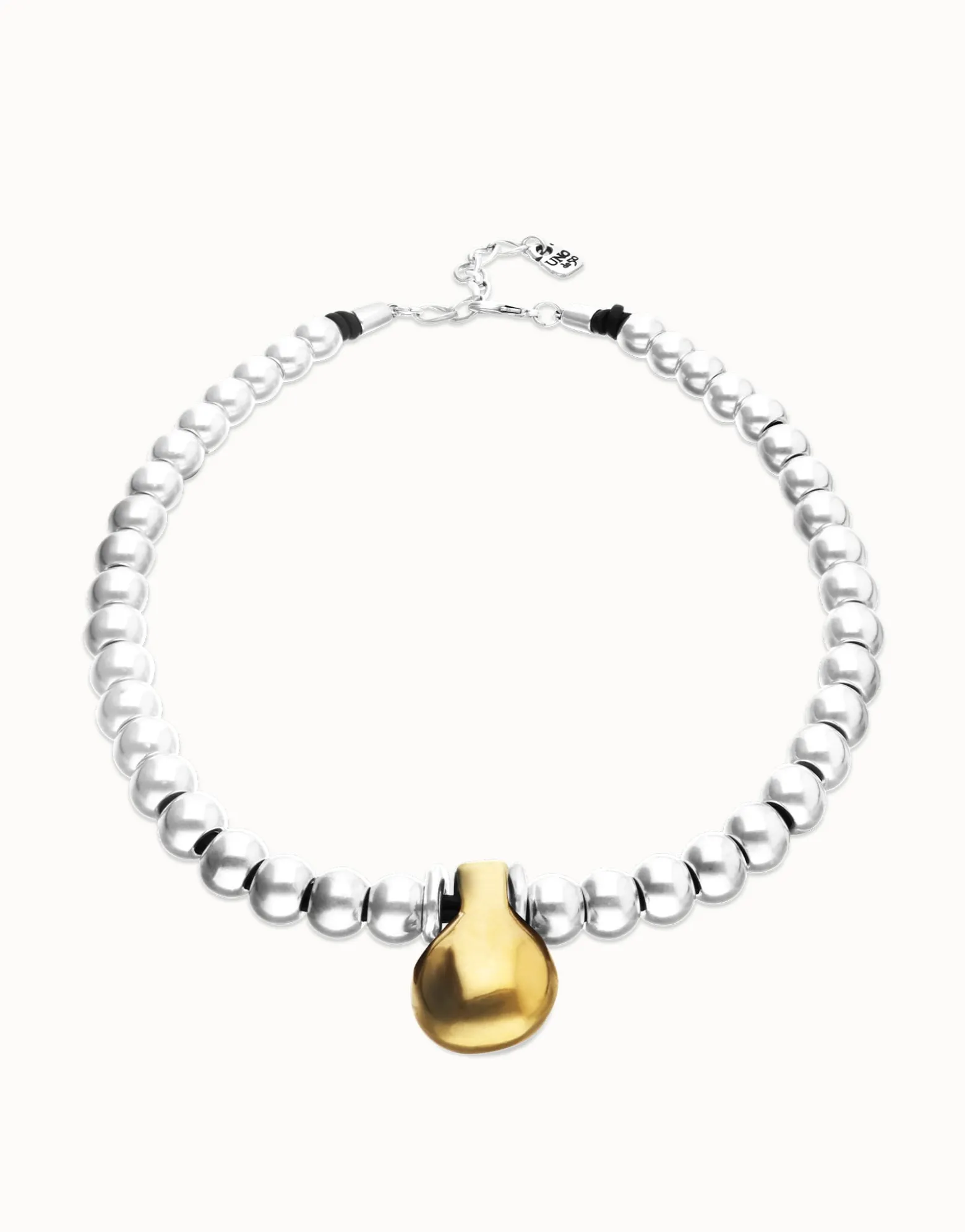 Beaded necklace with medium spheres and a large sphere
