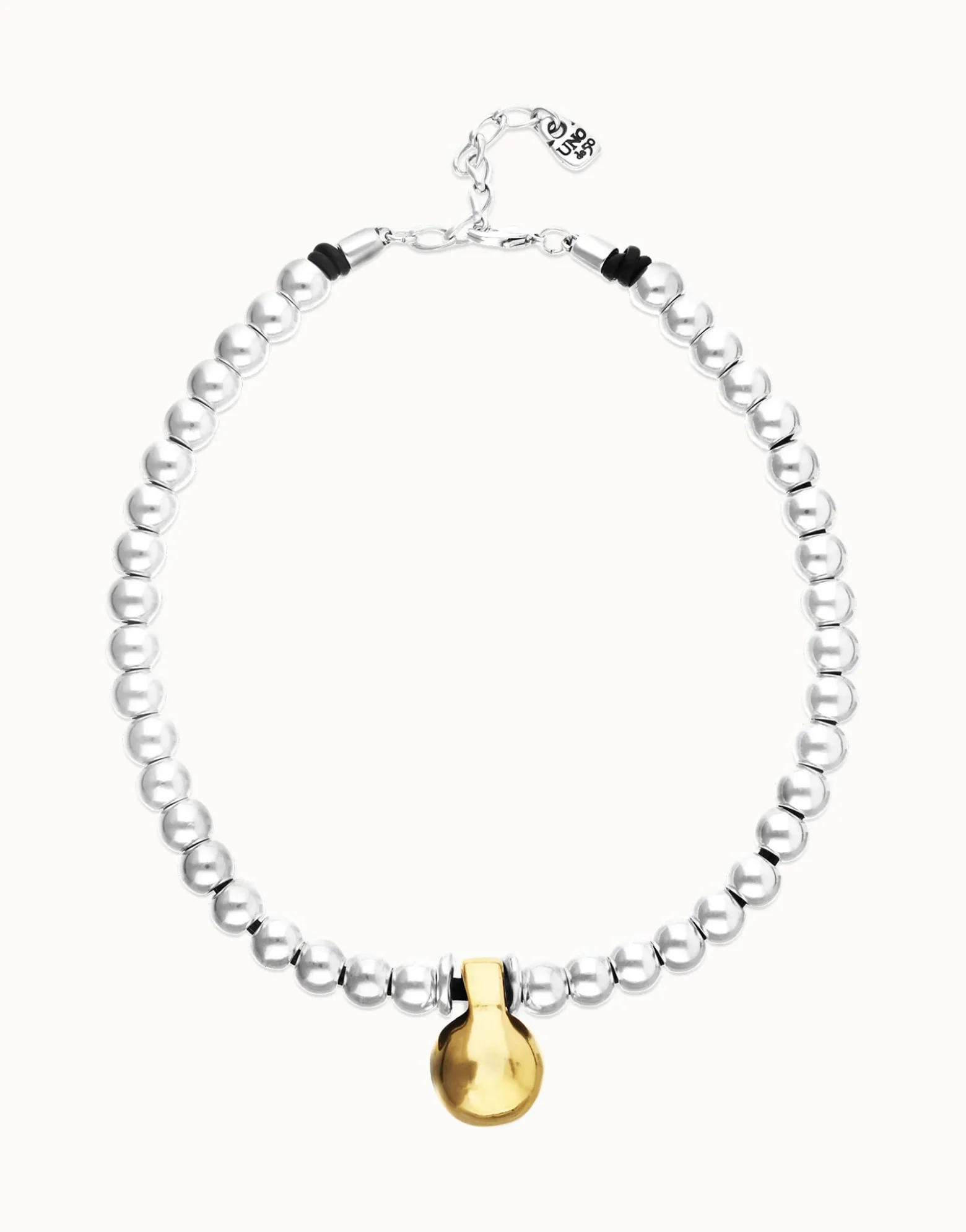 Beaded necklace with medium spheres and a large sphere