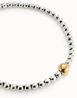 Beaded short necklace with larger central bead