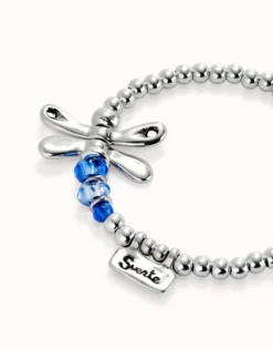 Beaded stretch bracelet with a dragonfly and blue crystal