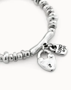 Beaded stretch bracelet with charms