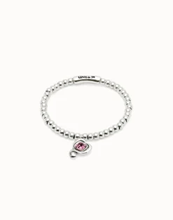 Beaded stretch bracelet with heart and pink crystal