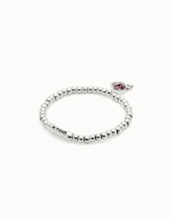 Beaded stretch bracelet with heart and pink crystal