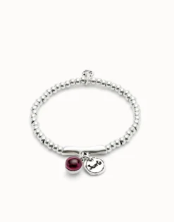 Beaded stretch bracelet with a murano glass and the word lucky