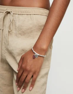 Beaded stretch bracelet with a murano glass and the word lucky