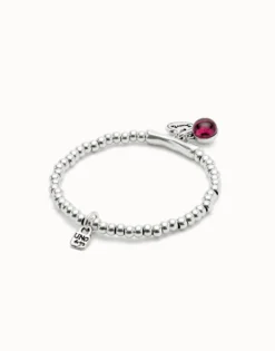 Beaded stretch bracelet with a murano glass and the word lucky