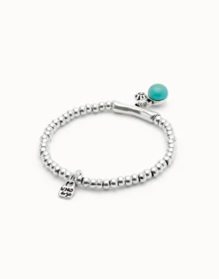 Beaded stretch bracelet with a murano glass and a hamsa
