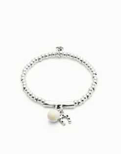 Beaded stretch bracelet with a murano glass and a horseshoe charm