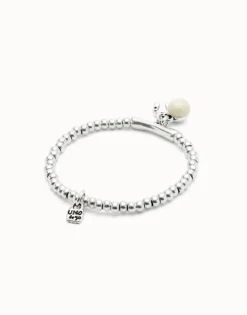 Beaded stretch bracelet with a murano glass and a horseshoe charm