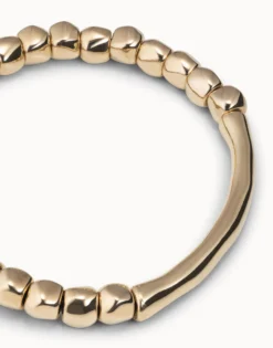Beaded stretch bracelet with tubular piece