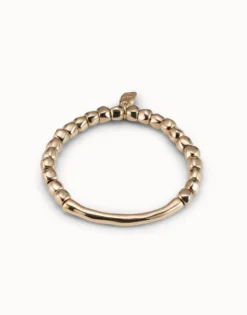 Beaded stretch bracelet with tubular piece