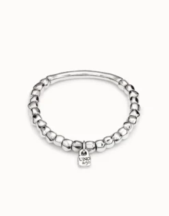 Beaded stretch bracelet with tubular piece