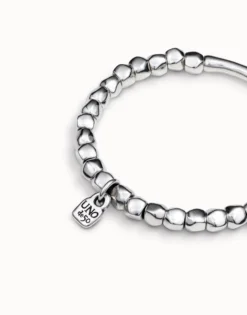 Beaded stretch bracelet with tubular piece