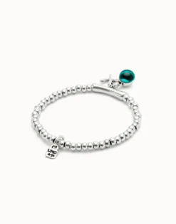 Beaded stretch bracelet with a murano glass and a dragonly