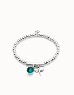 Beaded stretch bracelet with a murano glass and a dragonly
