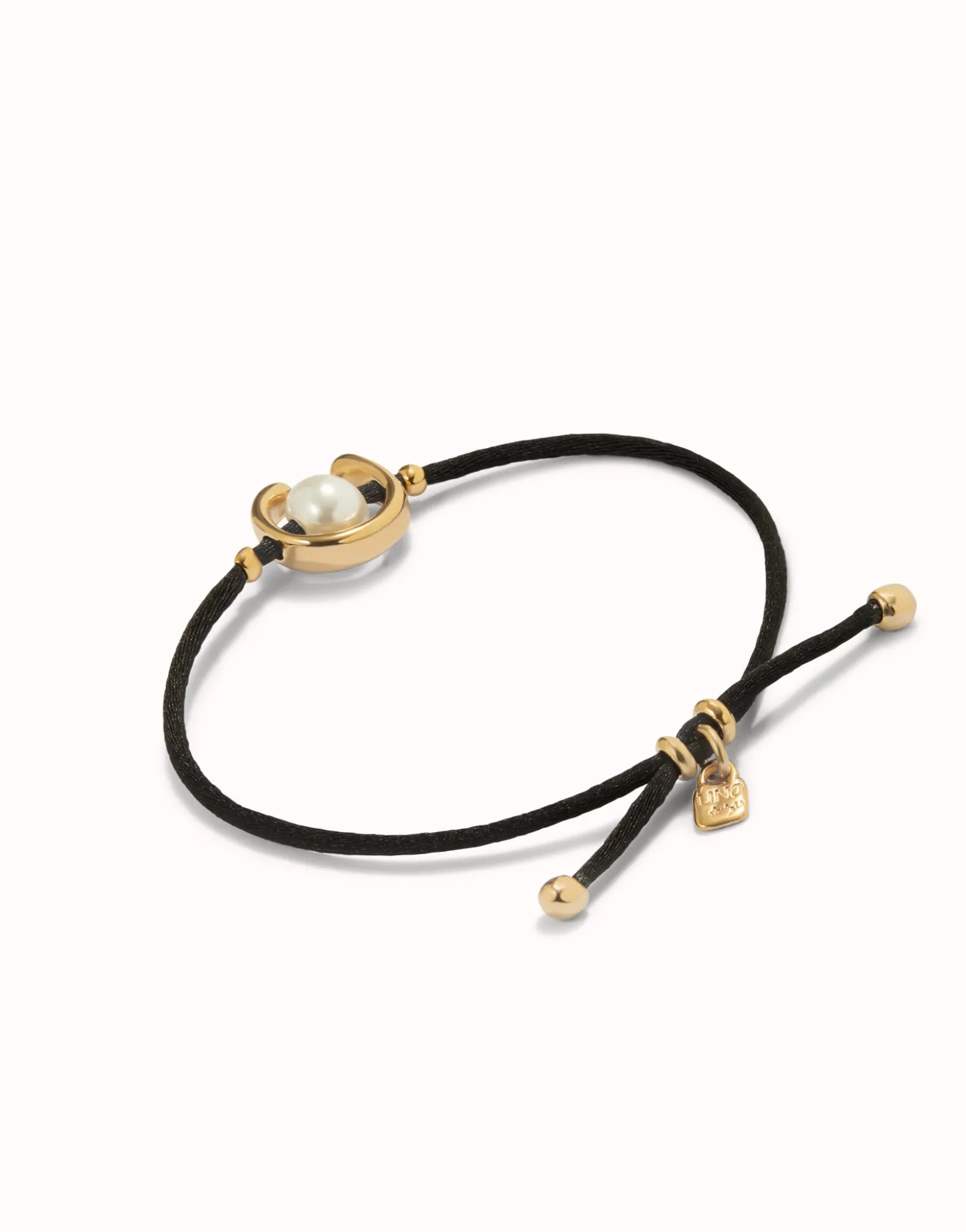 Black cord bracelet with a pearl
