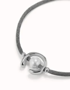 Black cord bracelet with a pearl