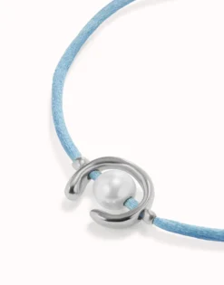 Blue cord bracelet with a pearl