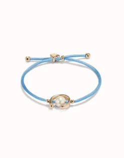 Blue cord bracelet with a pearl